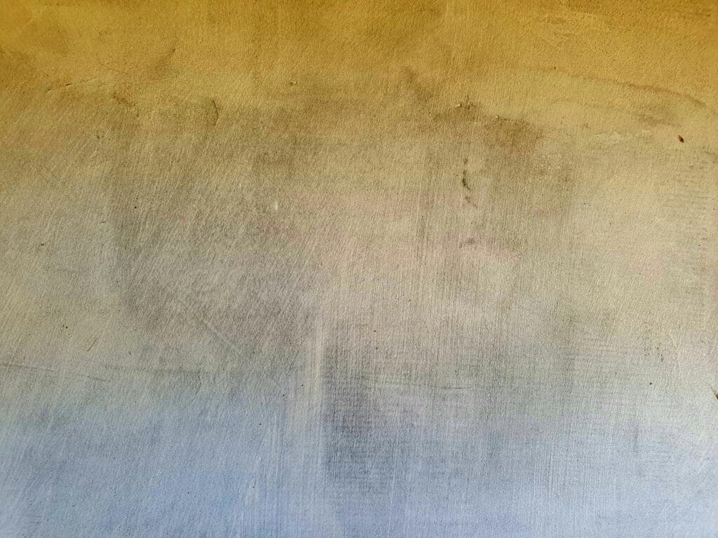 pexels-photo-2768390-2768390 A textured concrete wall with a gradient surface ideal for backgrounds.